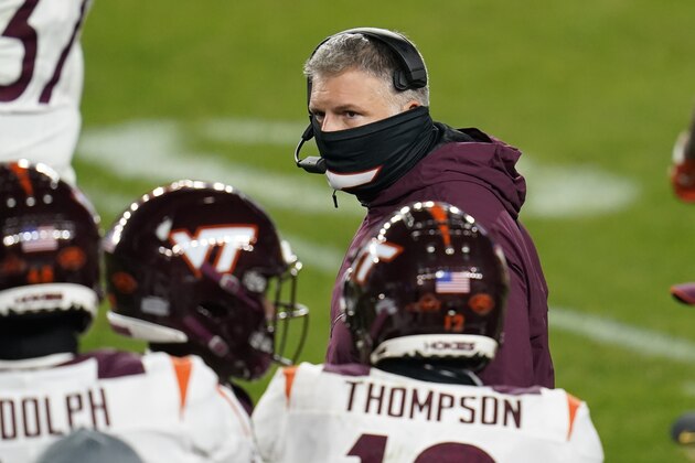 Virginia Tech head coach Justin Fuente talks to his team as they play against Pittsburgh in an NCAA college football game, Saturday, Nov. 21, 2020, in Pittsburgh. (AP Photo/Keith Srakocic)