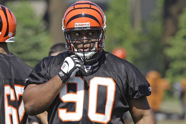 Cincinnati Bengals rookie defensive tackle Ekom Udofia (90) in action during the NFL football team's rookie minicamp, Friday, April 30, 2010, in Cincinnati. (AP Photo/Al Behrman)