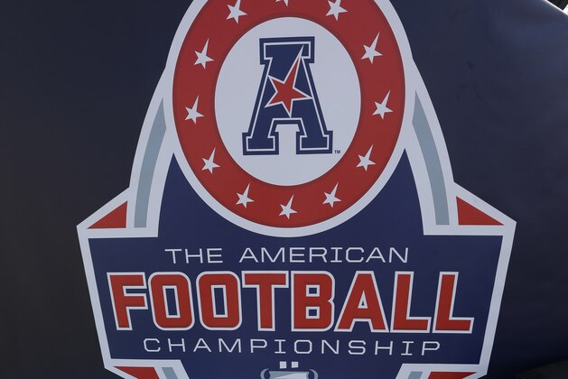 The American Athletic Conference logo is shown before  during the championship football game between Houston and Temple Saturday, Dec. 5, 2015, in Houston. (AP Photo/David J. Phillip)