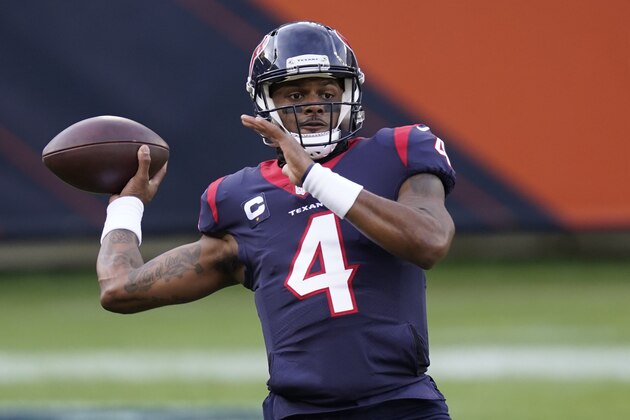 Houston Texans quarterback Deshaun Watson throws before an NFL football game against the Chicago Bears, Sunday, Dec. 13, 2020, in Chicago. (AP Photo/Charles Rex Arbogast)
