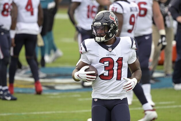 Houston Texans running back David Johnson (31) warms up before an NFL football game against the Jacksonville Jaguars, Sunday, Nov. 8, 2020, in Jacksonville, Fla. (AP Photo/Phelan M. Ebenhack)