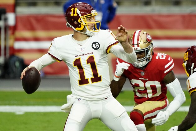 Washington Football Team quarterback Alex Smith (11) throws as San Francisco 49ers free safety Jimmie Ward (20) pursues during the first half of an NFL football game, Sunday, Dec. 13, 2020, in Glendale, Ariz. (AP Photo/Rick Scuteri)