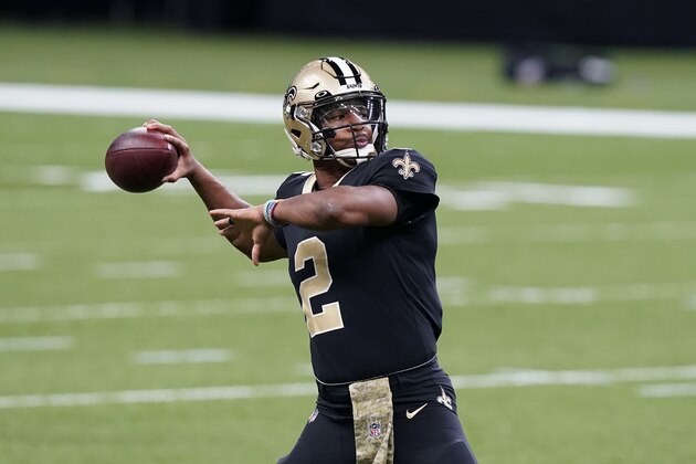 New Orleans Saints quarterback Jameis Winston (2) warms up before an NFL football game against the Atlanta Falcons in New Orleans, Sunday, Nov. 22, 2020. (AP Photo/Butch Dill)