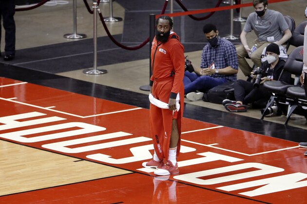 Houston Rockets guard James Harden leaves the court after their win against the San Antonio Spurs after an NBA basketball game Tuesday, Dec. 15, 2020, in Houston. (AP Photo/Michael Wyke)