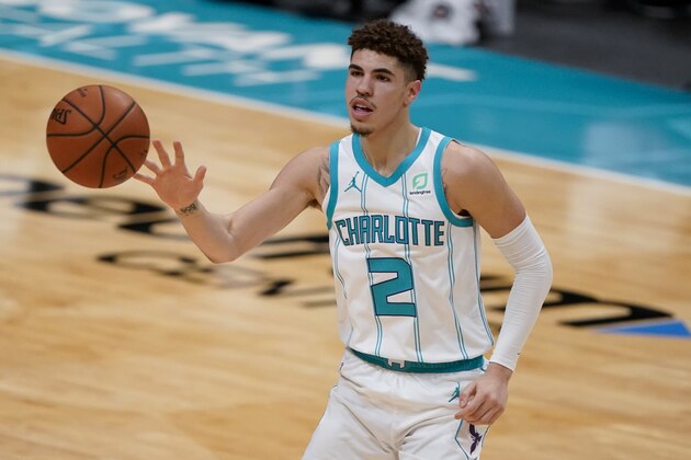 Charlotte Hornets guard LaMelo Ball plays against the Toronto Raptors during the second half of an NBA preseason basketball game in Charlotte, Monday, Dec. 14, 2020. (AP Photo/Chris Carlson)