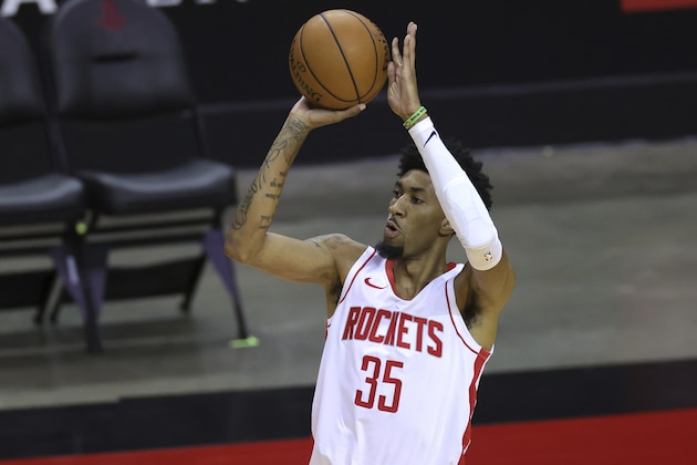 Houston Rockets' Christian Wood shoots during the second quarter of an NBA basketball game against the San Antonio Spurs in Houston, Thursday, Dec. 17, 2020. (Carmen Mandato/Pool Photo via AP)