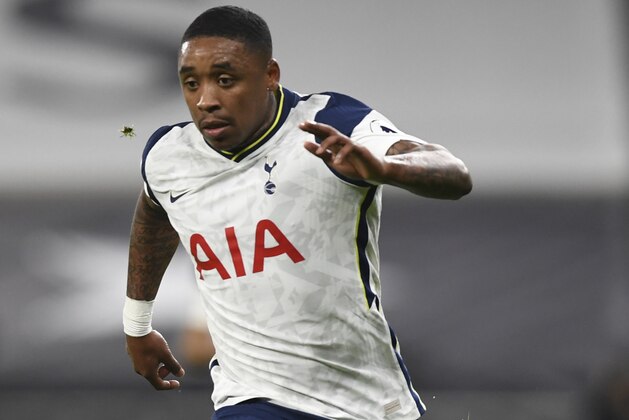 Tottenham's Steven Bergwijn runs with the ball during the English Premier League soccer match between Tottenham Hotspur and Manchester City at Tottenham Hotspur Stadium in London, England, Saturday, Nov. 21, 2020. (Neil Hall/Pool via AP)