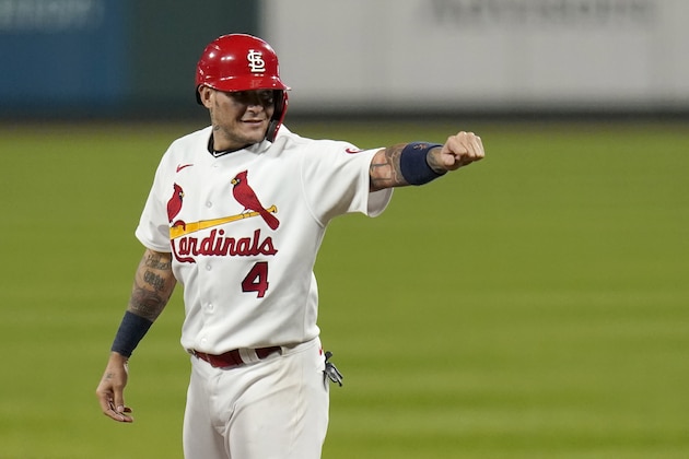 St. Louis Cardinals' Yadier Molina celebrates after hitting a single for his 2,000th career hit during the seventh inning of a baseball game against the Milwaukee Brewers Thursday, Sept. 24, 2020, in St. Louis. (AP Photo/Jeff Roberson) St. Louis Cardinals' Yadier Molina celebrates after hitting a single for his 2,000th career hit during the seventh inning of a baseball game against the Milwaukee Brewers Thursday, Sept. 24, 2020, in St. Louis. (AP Photo/Jeff Roberson)
