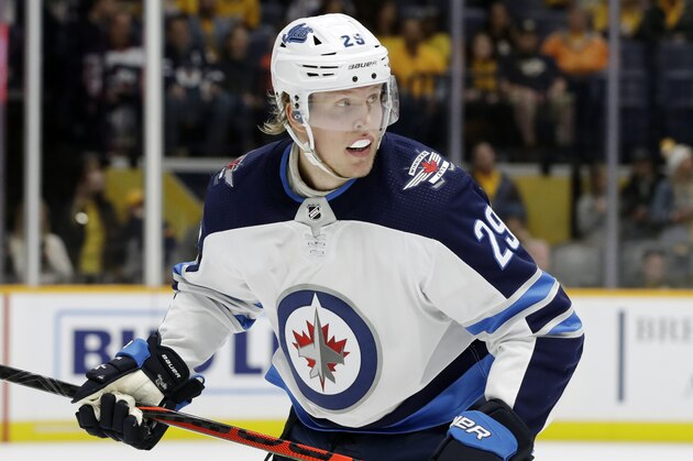 Winnipeg Jets right wing Patrik Laine, of Finland, plays against the Nashville Predators in the third period of an NHL hockey game Tuesday, Nov. 19, 2019, in Nashville, Tenn. The Jets won 2-1. (AP Photo/Mark Humphrey)