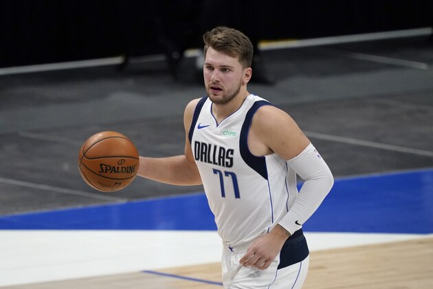 Dallas Mavericks' Luka Doncic handles the ball during an NBA preseason basketball game against the Minnesota Timberwolves in Dallas, Thursday, Dec. 17, 2020. (AP Photo/Tony Gutierrez)