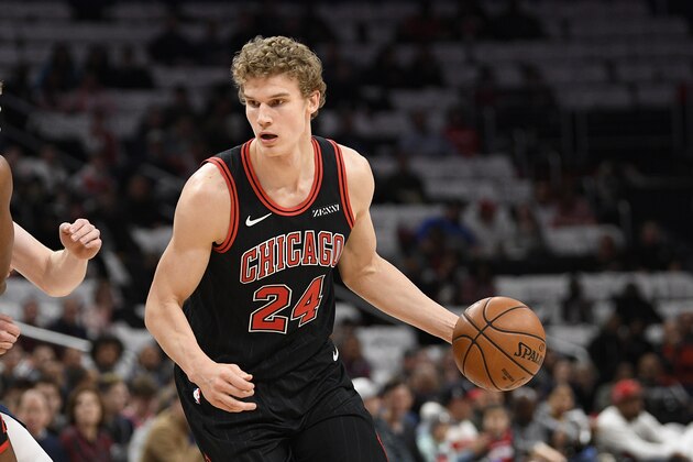 Chicago Bulls forward Lauri Markkanen (24) dribbles the ball during the first half of an NBA basketball game against the Washington Wizards, Wednesday, Dec. 18, 2019, in Washington. (AP Photo/Nick Wass)