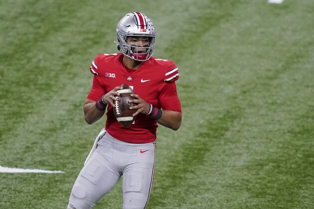 Ohio State quarterback Justin Fields drops back to pass during the first half of the Big Ten championship NCAA college football game against Northwestern, Saturday, Dec. 19, 2020, in Indianapolis. (AP Photo/Darron Cummings)