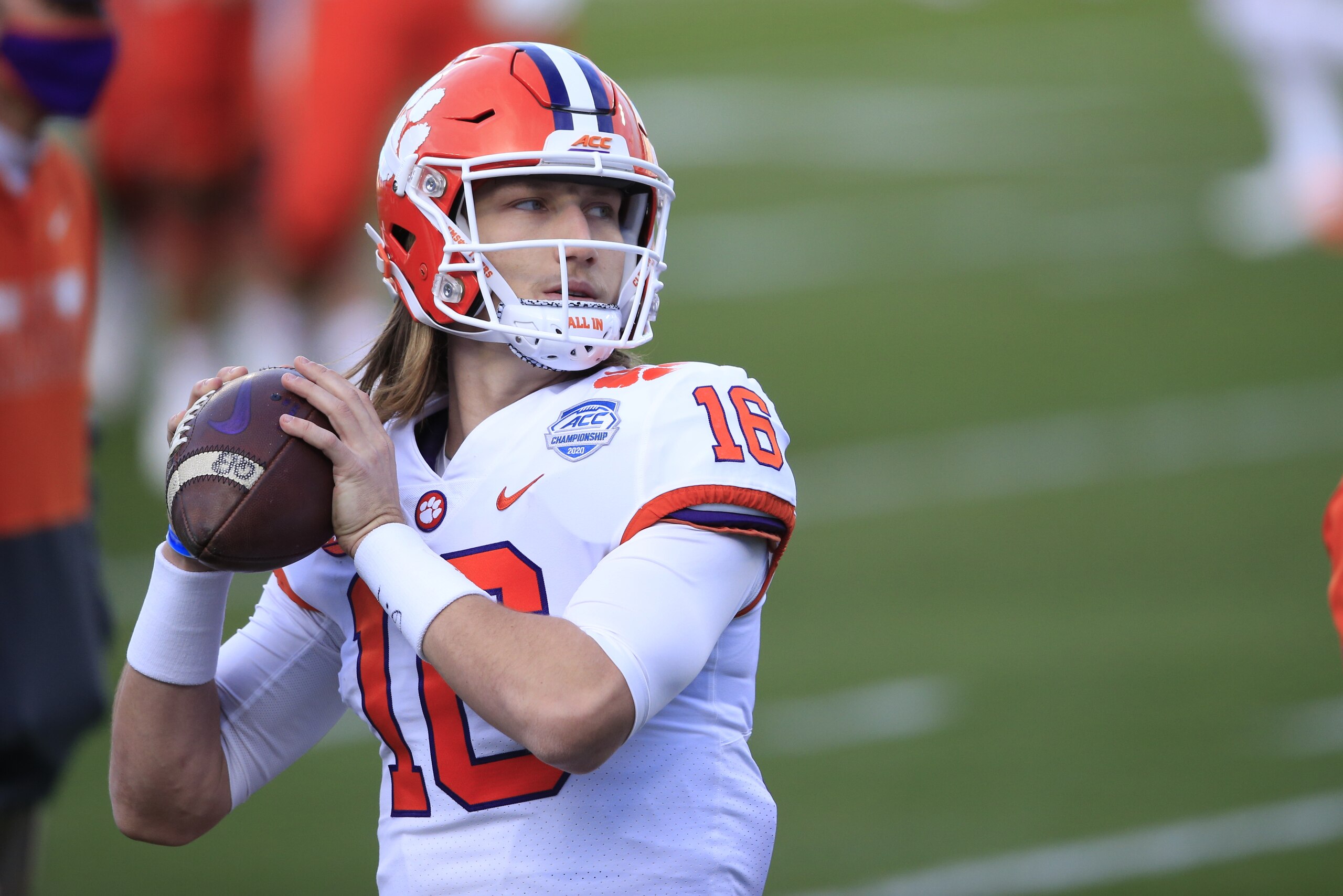 Clemson quarterback Trevor Lawrence (16) warms up before the start of the Atlantic Coast Conference championship NCAA college football game, Saturday, Dec. 19, 2020, in Charlotte, N.C. (AP Photo/Brian Blanco)
