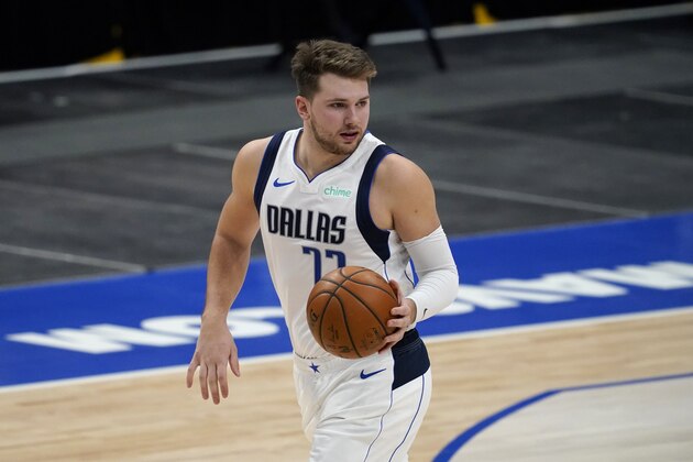 Dallas Mavericks' Luka Doncic handles the ball during an NBA preseason basketball game against the Minnesota Timberwolves in Dallas, Thursday, Dec. 17, 2020. (AP Photo/Tony Gutierrez)