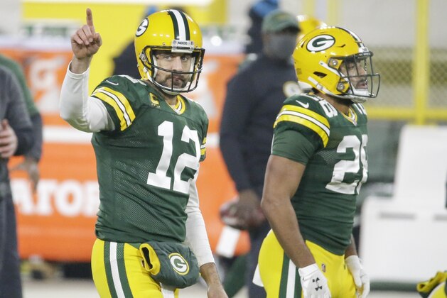 Green Bay Packers' Aaron Rodgers warms up before an NFL football game against the Carolina Panthers Saturday, Dec. 19, 2020, in Green Bay, Wis. (AP Photo/Mike Roemer)