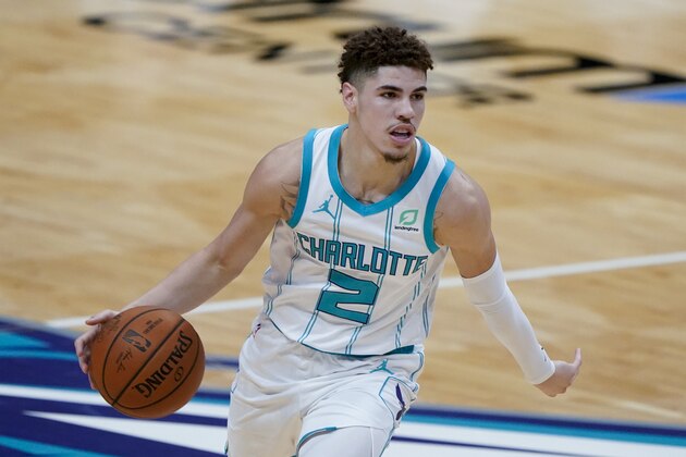 Charlotte Hornets guard LaMelo Ball plays against the Toronto Raptors during the second half of an NBA preseason basketball game in Charlotte, Monday, Dec. 14, 2020. (AP Photo/Chris Carlson)