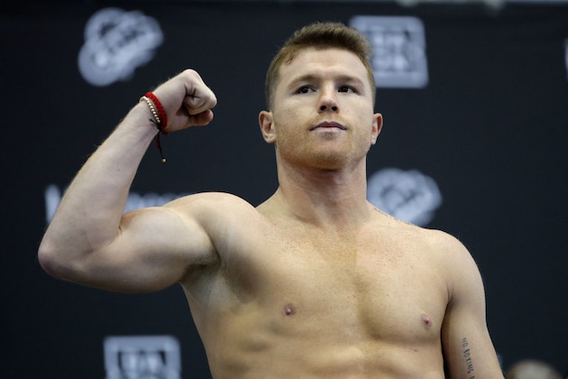 Canelo Alvarez stands on the scale during a weigh-in Friday, Nov. 1, 2019, in Las Vegas for his boxing bout against Sergey Kovalev for the WBO light heavyweight title Saturday.  (AP Photo/John Locher)