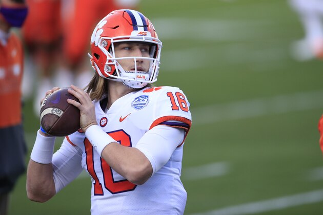 Clemson quarterback Trevor Lawrence (16) warms up before the start of the Atlantic Coast Conference championship NCAA college football game, Saturday, Dec. 19, 2020, in Charlotte, N.C. (AP Photo/Brian Blanco)