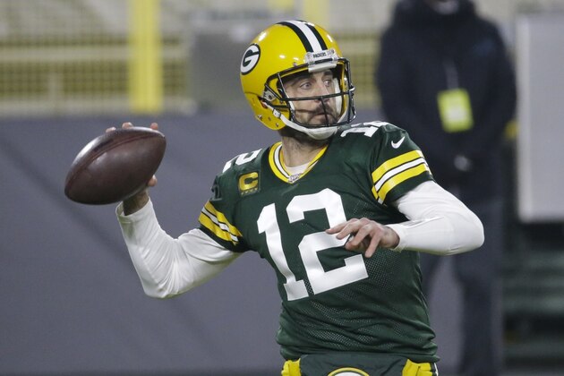 Green Bay Packers' Aaron Rodgers throws during the first half of an NFL football game against the Carolina Panthers Saturday, Dec. 19, 2020, in Green Bay, Wis. (AP Photo/Mike Roemer)
