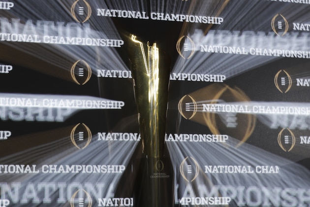 The Championship trophy is seen before a news conference for the NCAA college football playoff championship game Sunday, Jan. 8, 2017, in Tampa, Fla. (AP Photo/David J. Phillip)