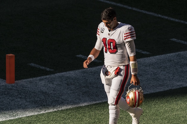 San Francisco 49ers quarterback Jimmy Garoppolo walks off the field after warmups before an NFL football game against the Seattle Seahawks, Sunday, Nov. 1, 2020, in Seattle. The Seahawks won 37-27. (AP Photo/Stephen Brashear)
