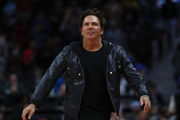 Detroit Pistons owner Tom Gores watches in the second half of an NBA basketball game against the Milwaukee Bucks in Detroit, Tuesday, Jan. 29, 2019. (AP Photo/Paul Sancya)
