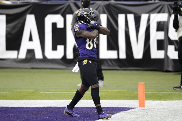 Baltimore Ravens wide receiver Dez Bryant reacts after scoring a touchdown against the Jacksonville Jaguars during the first half of an NFL football game, Sunday, Dec. 20, 2020, in Baltimore. (AP Photo/Nick Wass) Baltimore Ravens wide receiver Dez Bryant reacts after scoring a touchdown against the Jacksonville Jaguars during the first half of an NFL football game, Sunday, Dec. 20, 2020, in Baltimore. (AP Photo/Nick Wass)