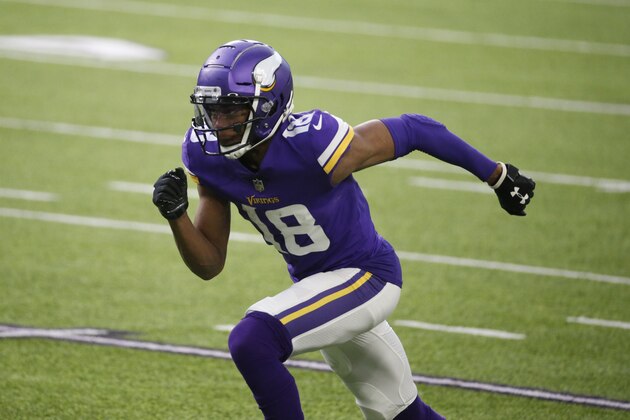 Minnesota Vikings wide receiver Justin Jefferson runs up field during the second half of an NFL football game against the Chicago Bears, Sunday, Dec. 20, 2020, in Minneapolis. (AP Photo/Bruce Kluckhohn)