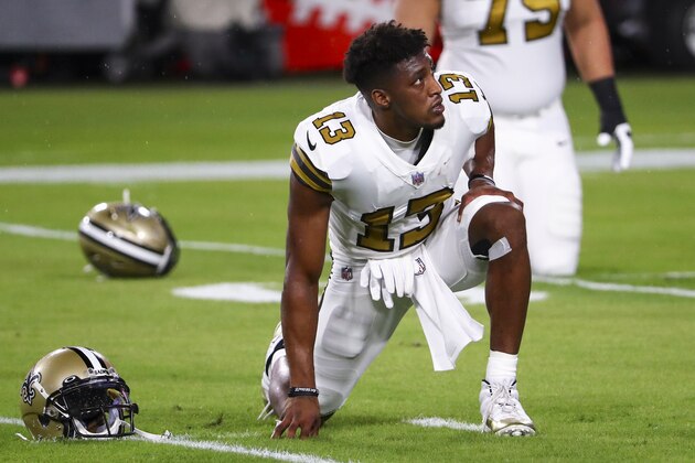 New Orleans Saints wide receiver Michael Thomas (13) stretches prior to an NFL football game against the Tampa Bay Buccaneers, Sunday, Nov. 8, 2020, in Tampa, Fla. (AP Photo/Kevin Sabitus)