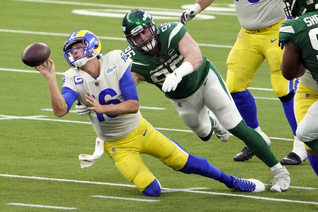 Los Angeles Rams quarterback Jared Goff throws the ball away as he is tackled by New York Jets defensive end Henry Anderson during the second half of an NFL football game Sunday, Dec. 20, 2020, in Inglewood, Calif. (AP Photo/Jae C. Hong) Los Angeles Rams quarterback Jared Goff throws the ball away as he is tackled by New York Jets defensive end Henry Anderson during the second half of an NFL football game Sunday, Dec. 20, 2020, in Inglewood, Calif. (AP Photo/Jae C. Hong)