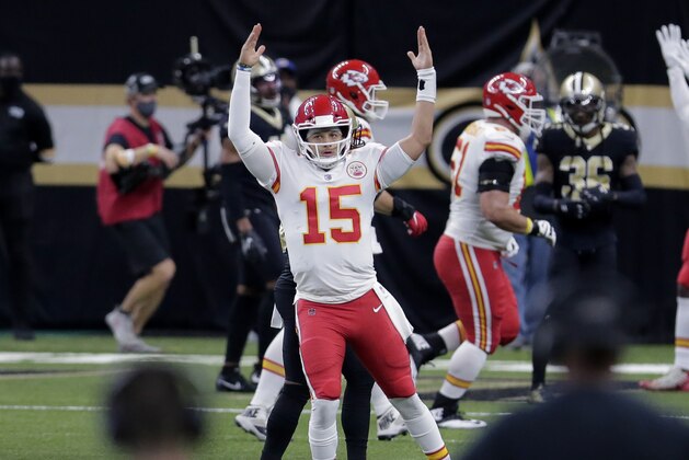 Kansas City Chiefs quarterback Patrick Mahomes (15) reacts after throwing a touchdown pass in the first half of an NFL football game against the New Orleans Saints in New Orleans, Sunday, Dec. 20, 2020. (AP Photo/Brett Duke)