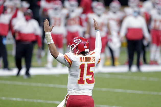 Kansas City Chiefs quarterback Patrick Mahomes (15) reacts after a touchdown by running back Le'Veon Bell in the second half of an NFL football game against the New Orleans Saints in New Orleans, Sunday, Dec. 20, 2020. (AP Photo/Brett Duke) Kansas City Chiefs quarterback Patrick Mahomes (15) reacts after a touchdown by running back Le'Veon Bell in the second half of an NFL football game against the New Orleans Saints in New Orleans, Sunday, Dec. 20, 2020. (AP Photo/Brett Duke)