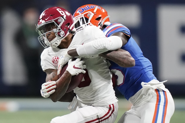 Alabama wide receiver DeVonta Smith (6) runs against Florida during the second half of the Southeastern Conference championship NCAA college football game, Saturday, Dec. 19, 2020, in Atlanta. (AP Photo/Brynn Anderson)