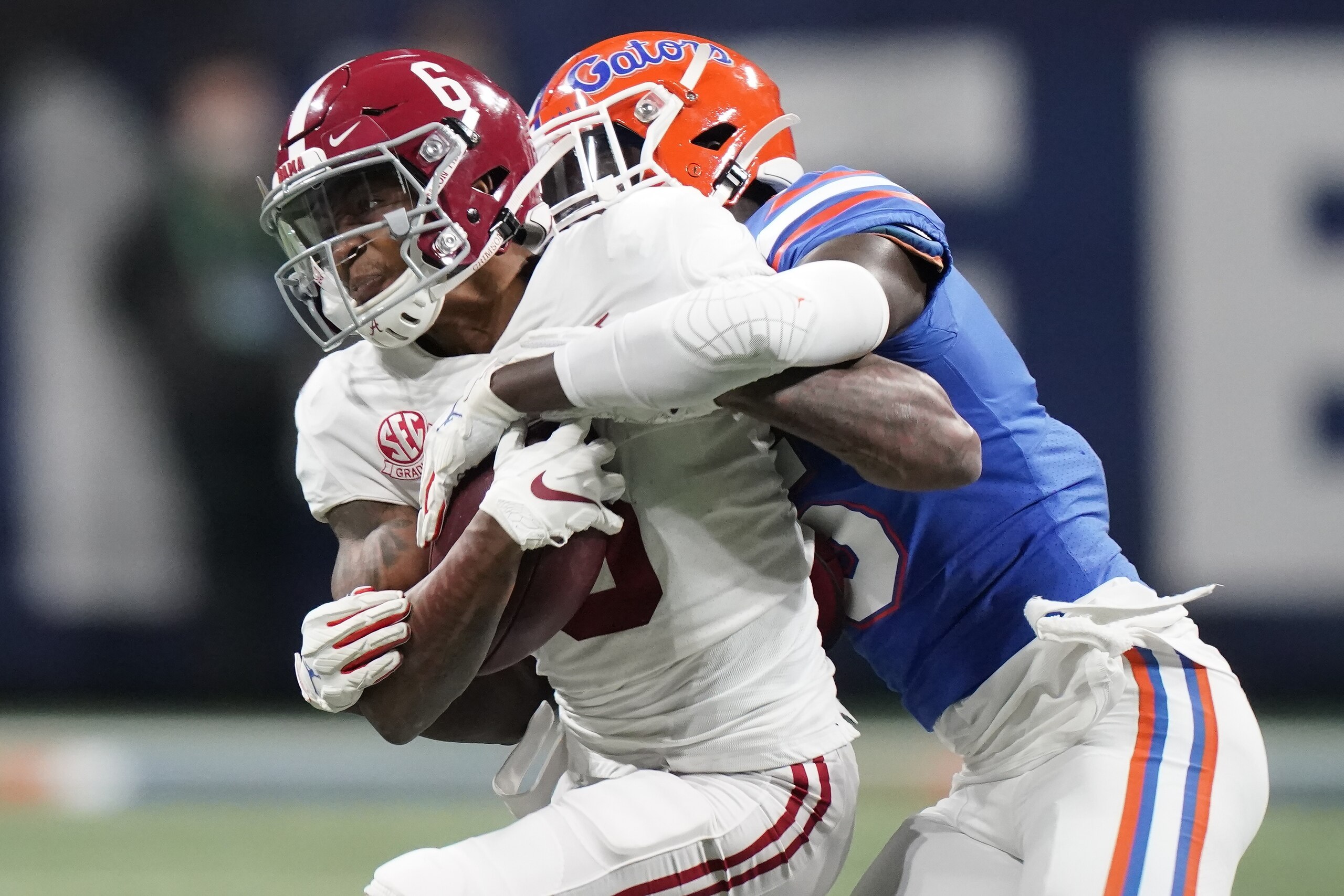 Alabama wide receiver DeVonta Smith (6) runs against Florida during the second half of the Southeastern Conference championship NCAA college football game, Saturday, Dec. 19, 2020, in Atlanta. (AP Photo/Brynn Anderson) Alabama wide receiver DeVonta Smith (6) runs against Florida during the second half of the Southeastern Conference championship NCAA college football game, Saturday, Dec. 19, 2020, in Atlanta. (AP Photo/Brynn Anderson)