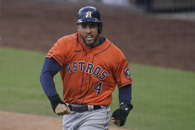 File-This Oct 16, 2020, file photo shows Houston Astros George Springer reacts after scoring on a single by Jose Altuve against the Tampa Bay Rays during the fifth inning in Game 6 of a baseball American League Championship Series in San Diego. Springer, New York Yankees second baseman DJ LeMahieu and Philadelphia catcher J.T. Realmuto were among just six free agents who received $18.9 million qualifying offers on Sunday, Nov. 1, 2020, from their former teams. Three right-handed pitchers also received the offers, Cincinnati’s Trevor Bauer, the New York Mets’ Marcus Stroman, and San Francisco's Kevin Gausman. (AP Photo/Gregory Bull, File)