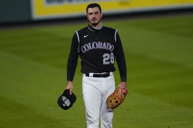 Colorado Rockies third baseman Nolan Arenado (28) in the fifth inning of a baseball game Saturday, Sept. 19, 2020, in Denver. (AP Photo/David Zalubowski) Colorado Rockies third baseman Nolan Arenado (28) in the fifth inning of a baseball game Saturday, Sept. 19, 2020, in Denver. (AP Photo/David Zalubowski)