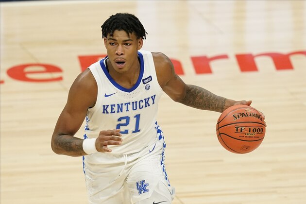 Kentucky's Cam'Ron Fletcher (21) dribbles during the second half of an NCAA college basketball game against Kansas, Tuesday, Dec. 1, 2020, in Indianapolis. (AP Photo/Darron Cummings)