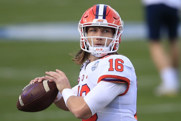 Clemson quarterback Trevor Lawrence (16) warms up before the start of the Atlantic Coast Conference championship NCAA college football game against Notre Dame, Saturday, Dec. 19, 2020, in Charlotte, N.C. (AP Photo/Brian Blanco) Clemson quarterback Trevor Lawrence (16) warms up before the start of the Atlantic Coast Conference championship NCAA college football game against Notre Dame, Saturday, Dec. 19, 2020, in Charlotte, N.C. (AP Photo/Brian Blanco)