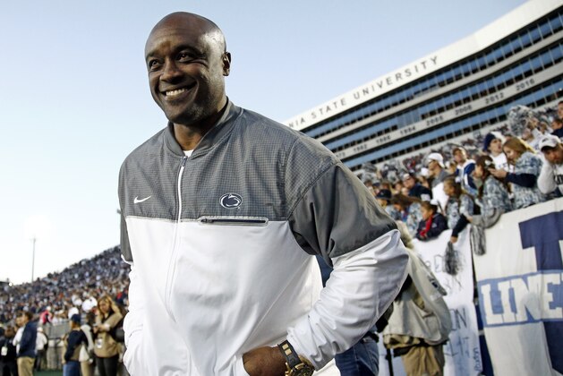Former Penn State running back Ki Jana Carter, walks the sidelines as the team takes on Indiana during the first half of an NCAA college football game in State College, Pa., Saturday, Sept. 30, 2017. (AP Photo/Chris Knight)