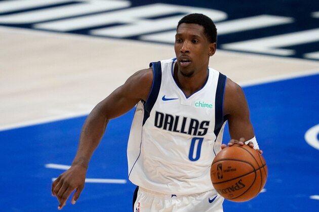 Dallas Mavericks' Josh Richardson advances the ball up court during an NBA preseason basketball game against the Minnesota Timberwolves in Dallas, Thursday, Dec. 17, 2020. (AP Photo/Tony Gutierrez)