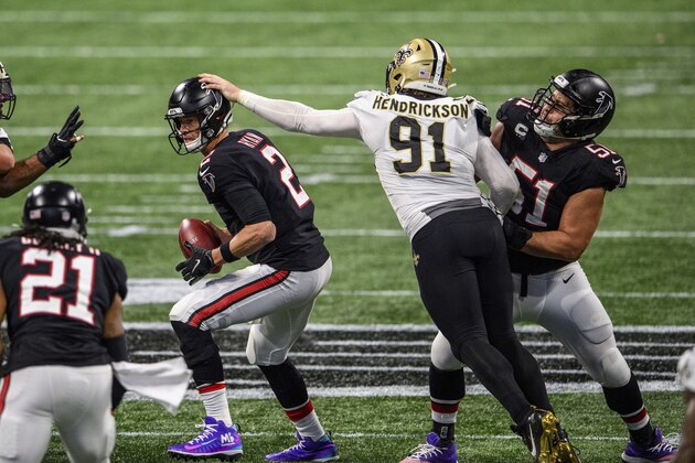 New Orleans Saints defensive end Trey Hendrickson (91) reaches for Atlanta Falcons quarterback Matt Ryan (2) as center Alex Mack (51) blocks during the second half of an NFL football game, Sunday, Dec. 6, 2020, in Atlanta. The New Orleans Saints won 21-16. (AP Photo/Danny Karnik)