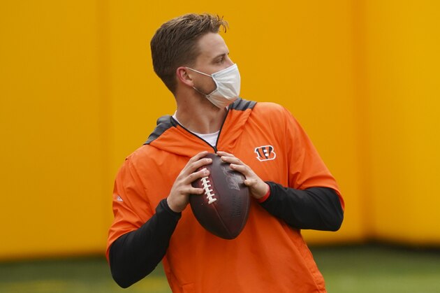 Cincinnati Bengals quarterback Joe Burrow (9) preparing to throw the ball during pregame before the start of an NFL football game against the Washington Football Team, Sunday, Nov. 22, 2020, in Landover, Md. (AP Photo/Andrew Harnik)