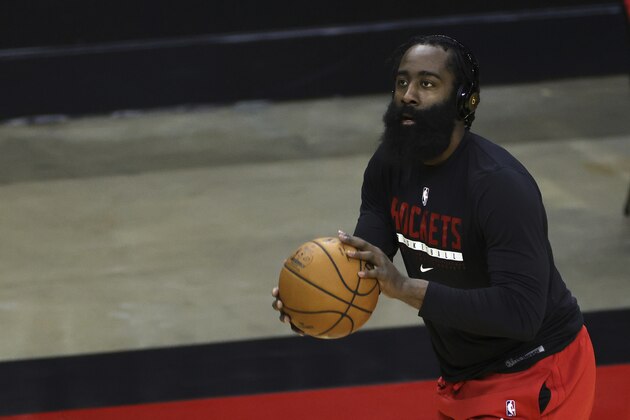 Houston Rockets' James Harden warms up prior to facing the San Antonio Spurs in an NBA basketball game in Houston, Thursday, Dec. 17, 2020. (Carmen Mandato/Pool Photo via AP)