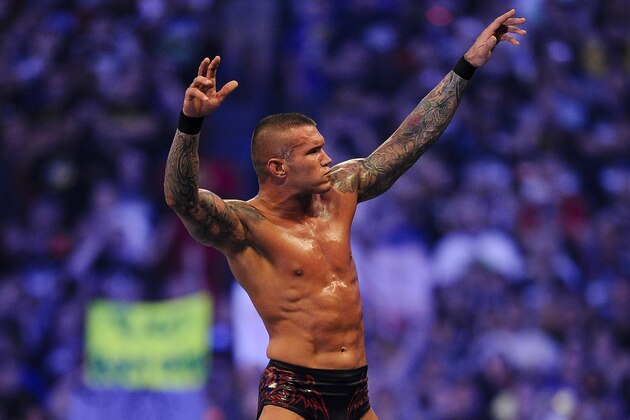 FILE- In this Sunday, April 3, 2011 file photo, WWE Superstar Randy Orton celebrates defeating CM Punk (not pictured) during WrestleMania XXVII at the Georgia Dome in Atlanta, Georgia on. World-famous WWE wrestlers such as John Cena, Shaemus and champion Randy Orton are in Saudi Arabia for three days of matches in the capital Riyadh. (Paul Abell/AP Images for WWE, File)