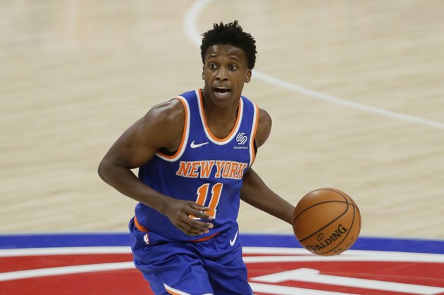 New York Knicks guard Frank Ntilikina (11) looks to pass the ball against the Detroit Pistons during the second half of an NBA basketball game Sunday, Dec. 13, 2020, in Detroit. (AP Photo/Duane Burleson)