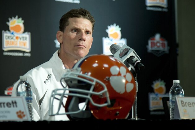 FILE- In this Dec. 31, 2013, file photo, Clemson defensive coordinator Brent Venables talks to the media during an NCAA college football news conference in Fort Lauderdale, Fla. Venables said the Clemson defense worked too hard to get to No. 1 to give up simply because it lost eight starters, Wednesday, March 4, 2015. (AP Photo/J Pat Carter, File)