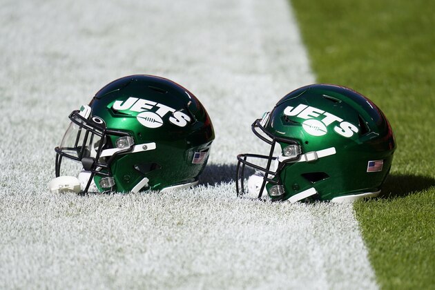 A pair of New York Jets helmets are shown on the field before an NFL football game against the Kansas City Chiefs on Sunday, Nov. 1, 2020, in Kansas City, Mo. (AP Photo/Jeff Roberson)