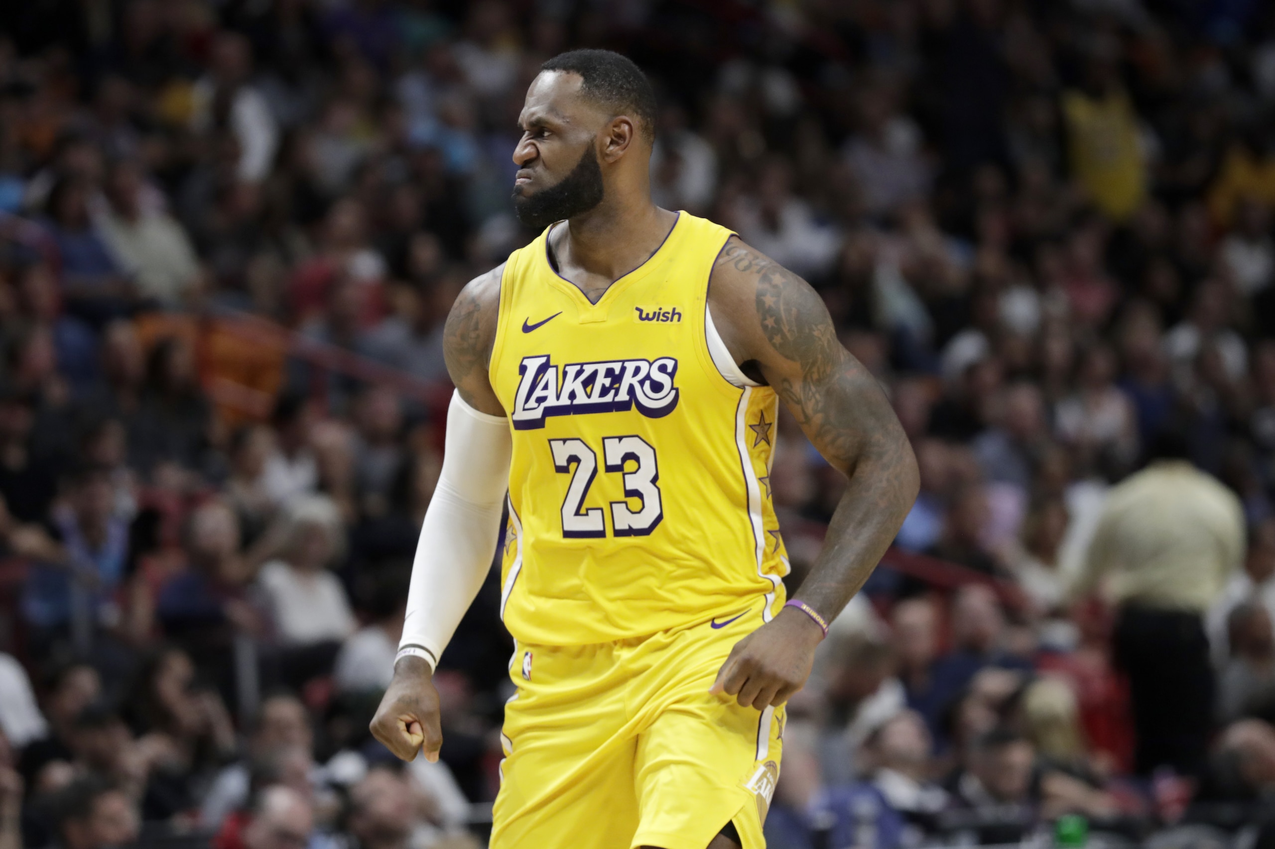 Los Angeles Lakers forward LeBron James (23) reacts during the second half of an NBA basketball game against the Miami Heat, Friday, Dec. 13, 2019, in Miami. The Lakers won 113-110. (AP Photo/Lynne Sladky) Los Angeles Lakers forward LeBron James (23) reacts during the second half of an NBA basketball game against the Miami Heat, Friday, Dec. 13, 2019, in Miami. The Lakers won 113-110. (AP Photo/Lynne Sladky)