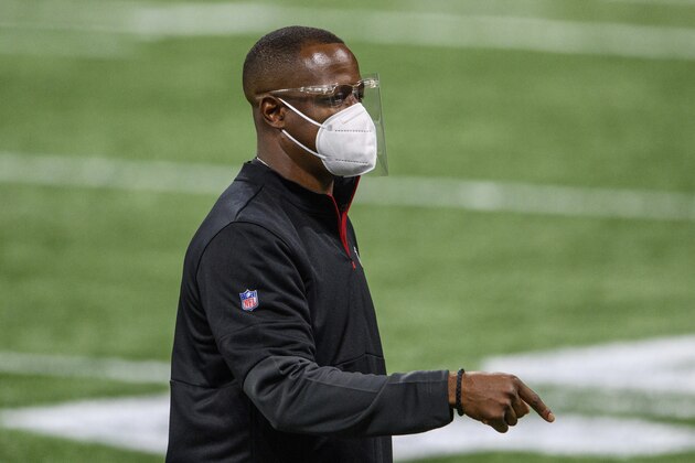 Atlanta Falcons interim head coach Raheem Morris walks on the field before an NFL football game against the Las Vegas Raiders, Sunday, Nov. 29, 2020, in Atlanta. The Atlanta Falcons won 43-6. (AP Photo/Danny Karnik)