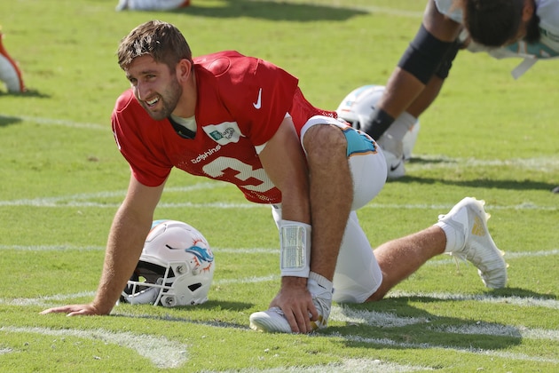 Miami Dolphins quarterback Josh Rosen (3) stretches during an NFL football training camp practice in Davie, Fla., Tuesday, Sept. 1, 2020. (AP Photo/Joel Auerbach)